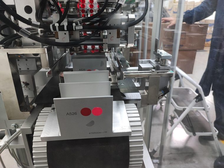 Tren de cangilones para encartonadora impresos en 3D por Proinn